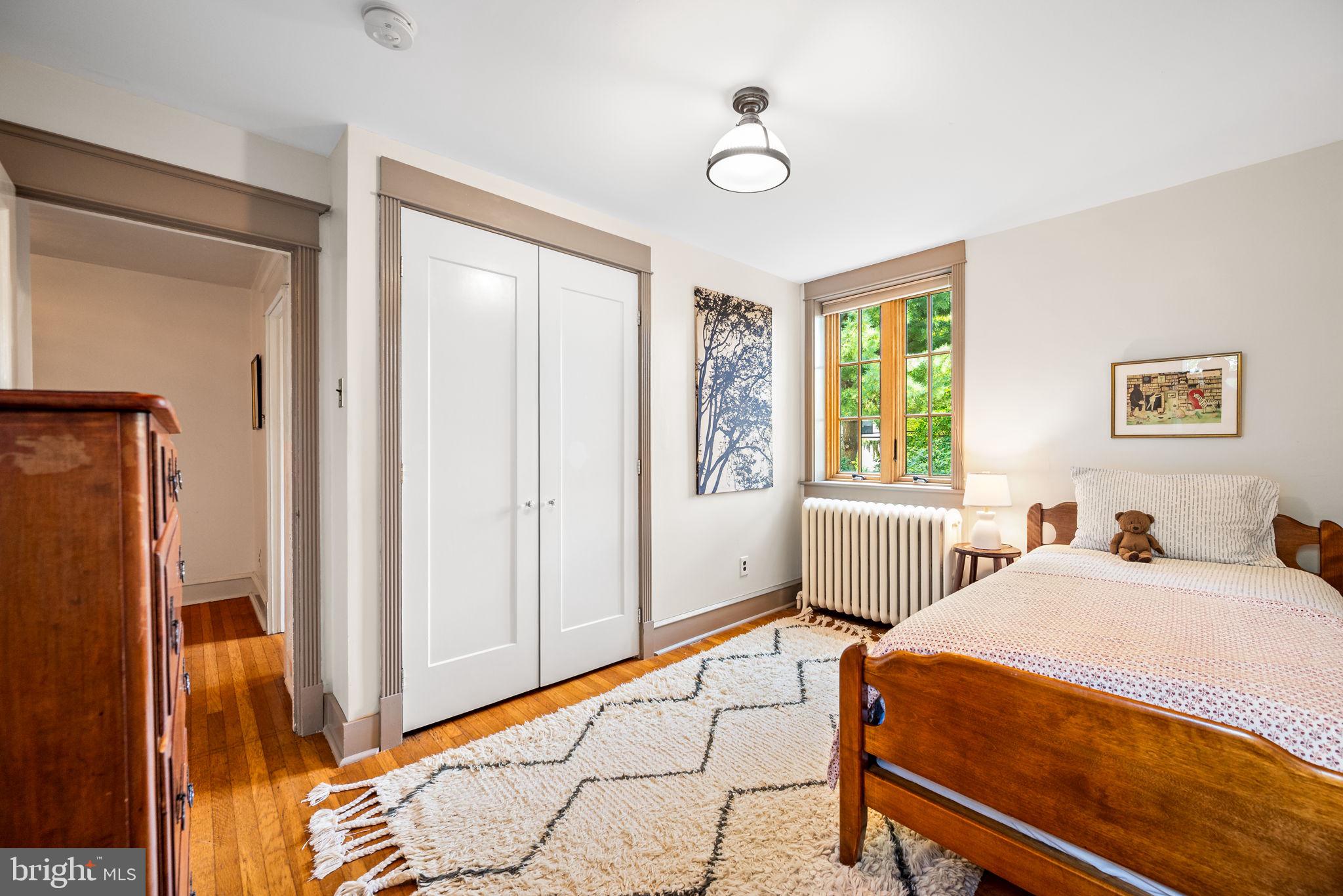 3310 West Penn Street Philadelphia, PA 19129 - Photo 18 of 26 a bedroom with two beds and a window