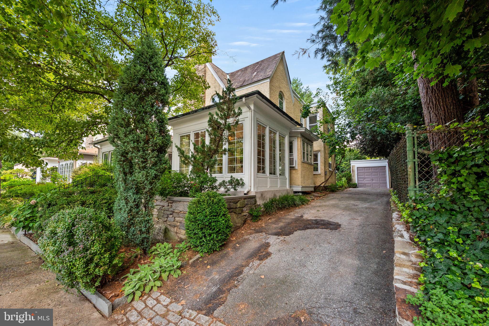 3310 West Penn Street Philadelphia, PA 19129 - Photo 24 of 26 a front view of a house with garden