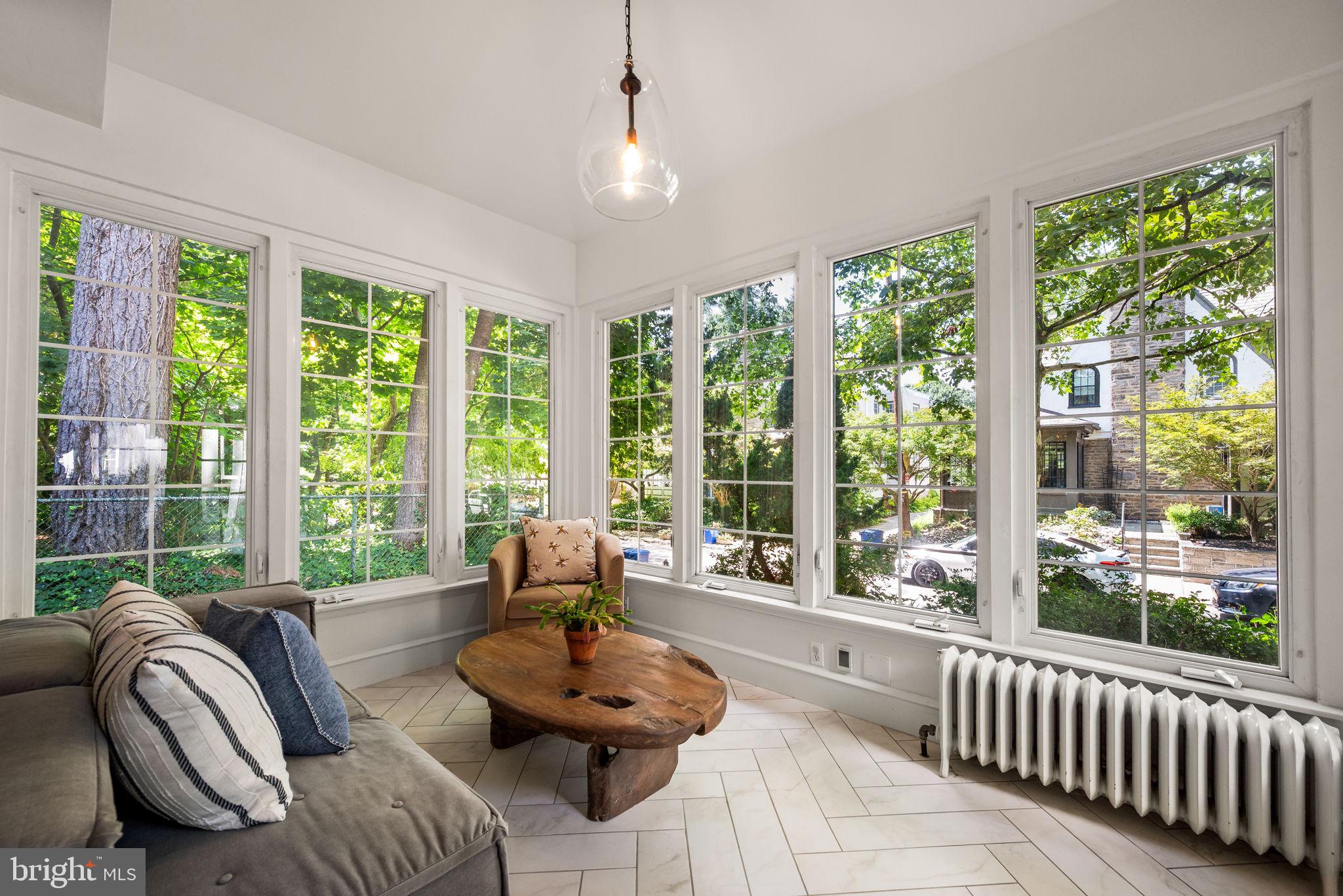 3310 West Penn Street Philadelphia, PA 19129 - Photo 4 of 26 a living room with furniture and a large window