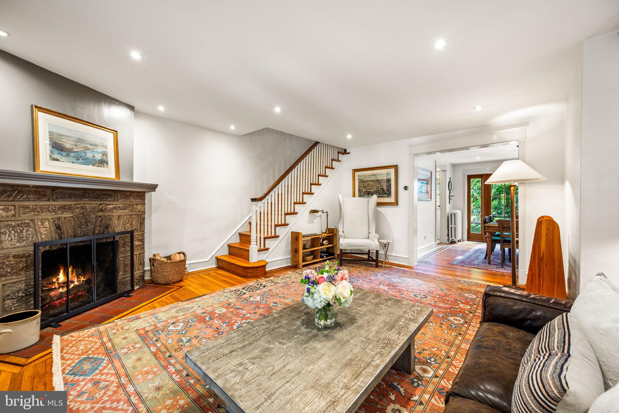 3310 West Penn Street Philadelphia, PA 19129 - Photo 6 of 26 a living room with furniture and a fireplace