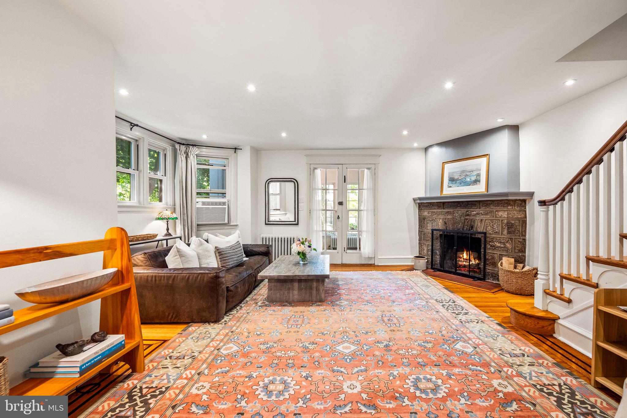 3310 West Penn Street Philadelphia, PA 19129 - Photo 7 of 26 a living room with furniture and a fireplace
