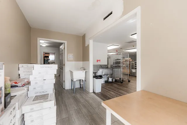 a view of a living room and dining room