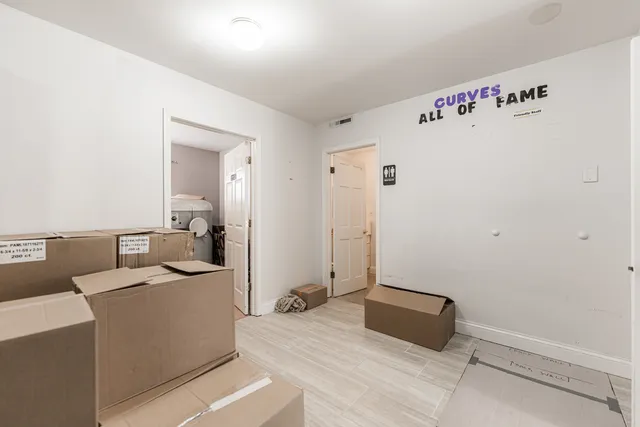 a room with a couch and a table in it