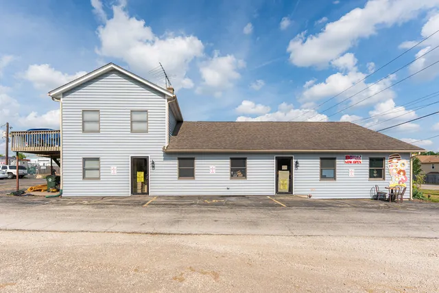 a view of a house with a patio