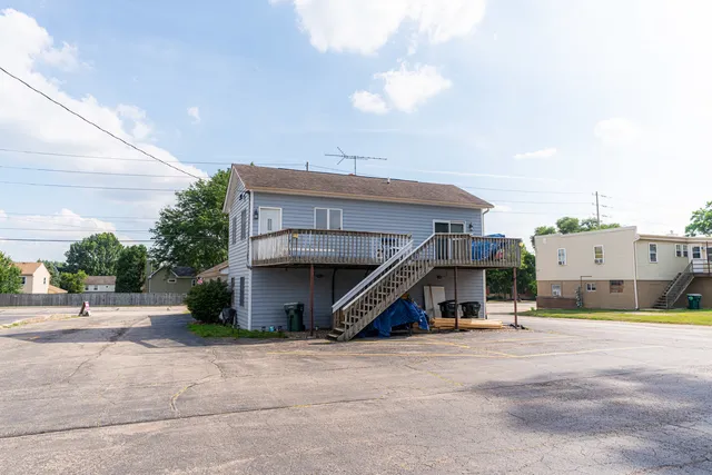 a view of a house with a street