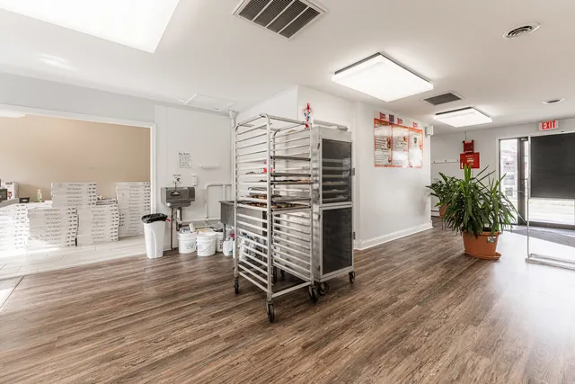 a view of livingroom with furniture and floor to ceiling window