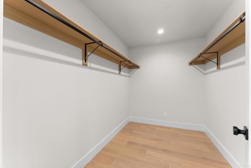 4200 Tonopah Avenue San Diego, CA 92110 - Photo 16 of 25 a view of a room with racks on the wall