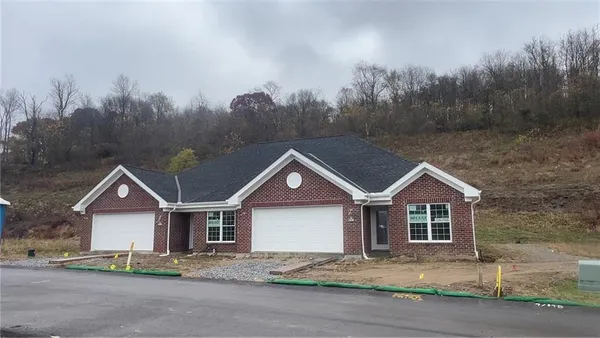 a view of house with a street