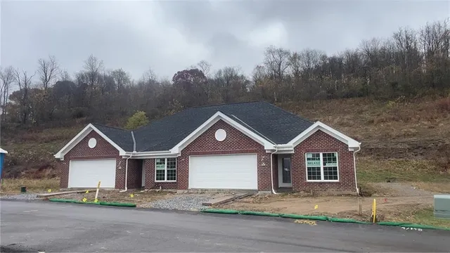 a view of house with a street