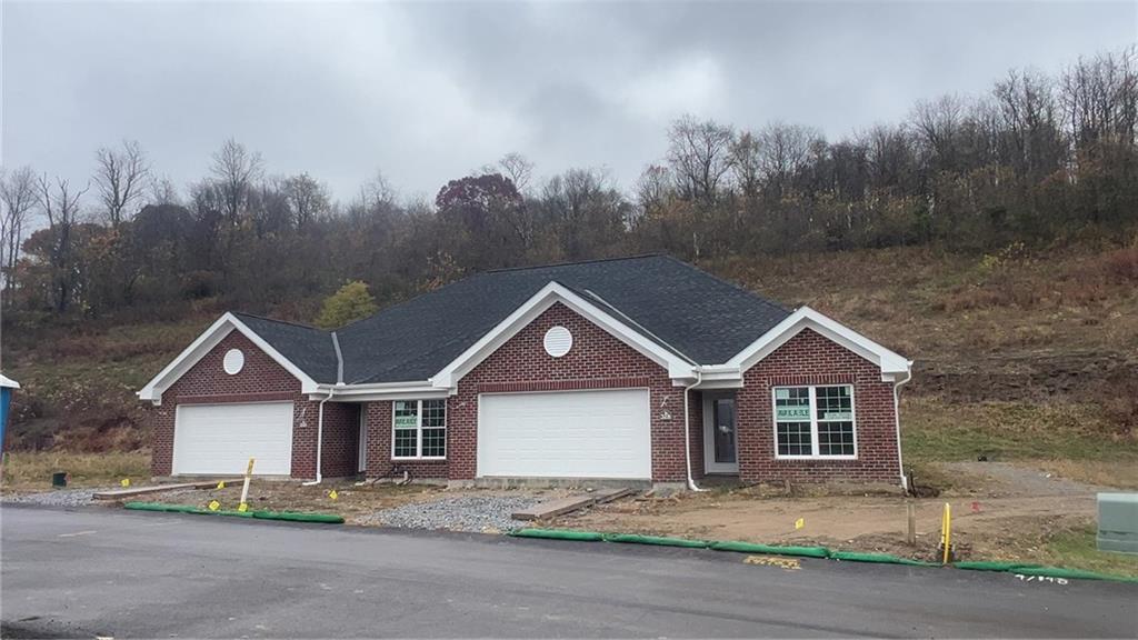 328 River Rdg Court, Unit 47B Baden, PA 15005 - Photo 1 of 20 a view of house with a street