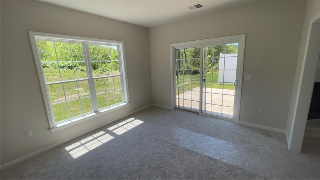 328 River Rdg Court, Unit 47B Baden, PA 15005 - Photo 13 of 20 a view of an empty room with windows