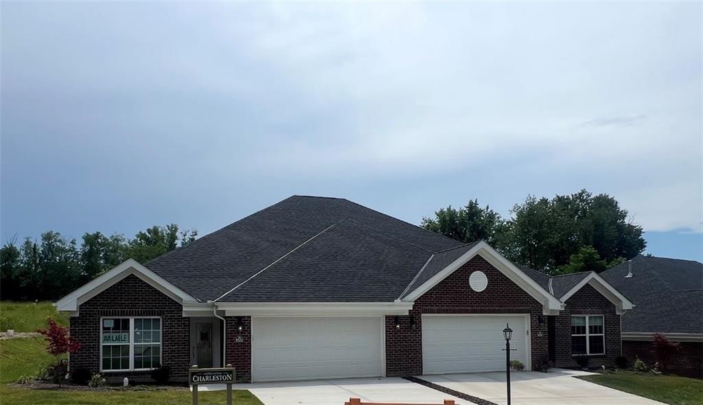 328 River Rdg Court, Unit 47B Baden, PA 15005 - Photo 3 of 20 a front view of a house with a yard