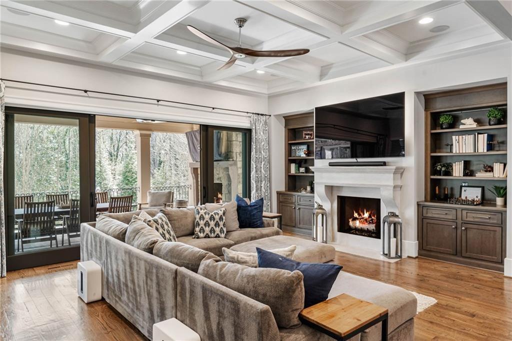 5265 Peachtree Dunwoody Road Sandy Springs, GA 30342 - Photo 20 of 122 a living room with furniture fireplace and flat screen tv