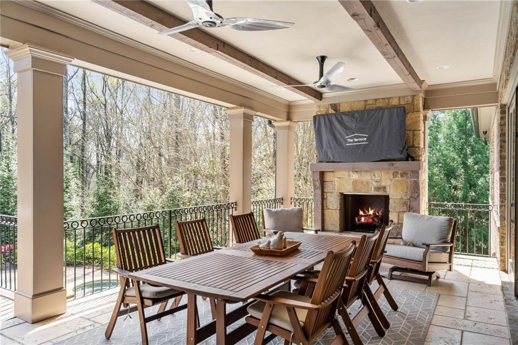 5265 Peachtree Dunwoody Road Sandy Springs, GA 30342 - Photo 21 of 122 a view of a dining room with furniture window and outside view