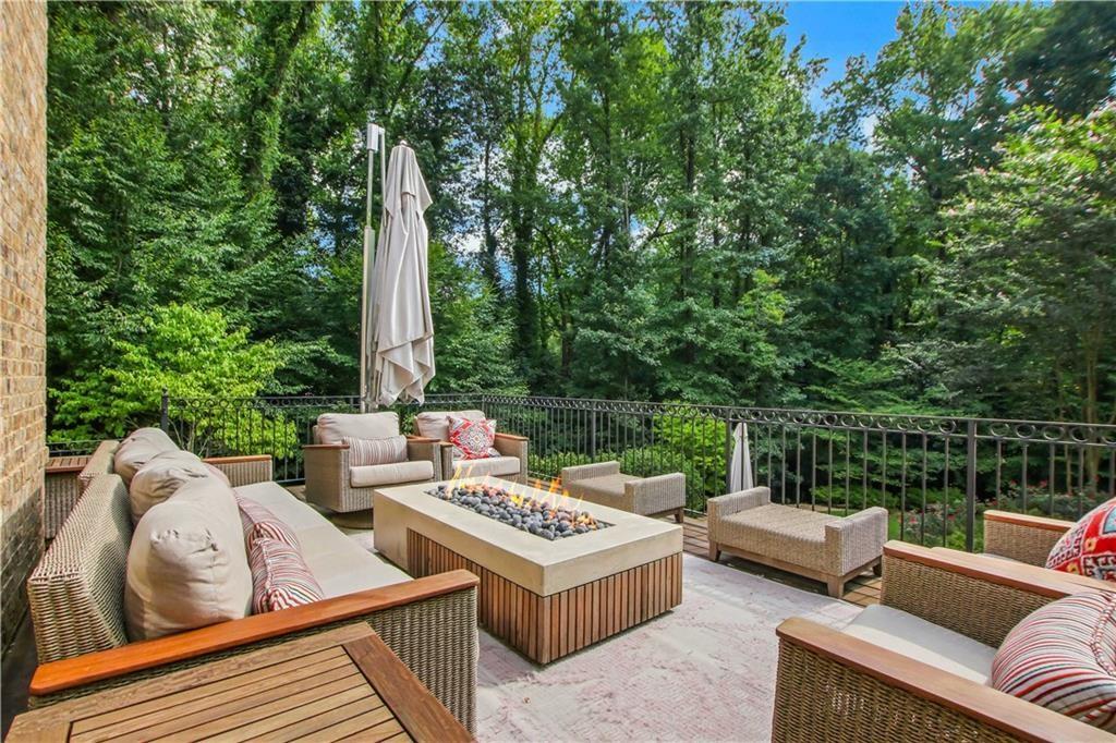 5265 Peachtree Dunwoody Road Sandy Springs, GA 30342 - Photo 77 of 122 a view of a patio with couches and pool