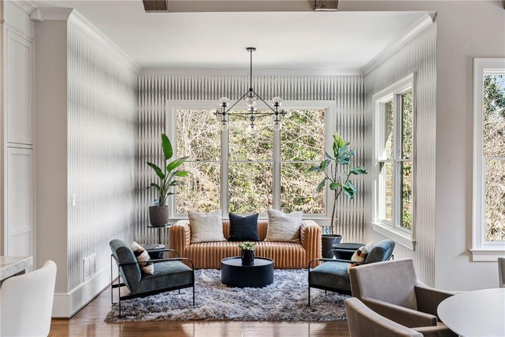 5265 Peachtree Dunwoody Road Sandy Springs, GA 30342 - Photo 8 of 122 a living room with furniture and a chandelier