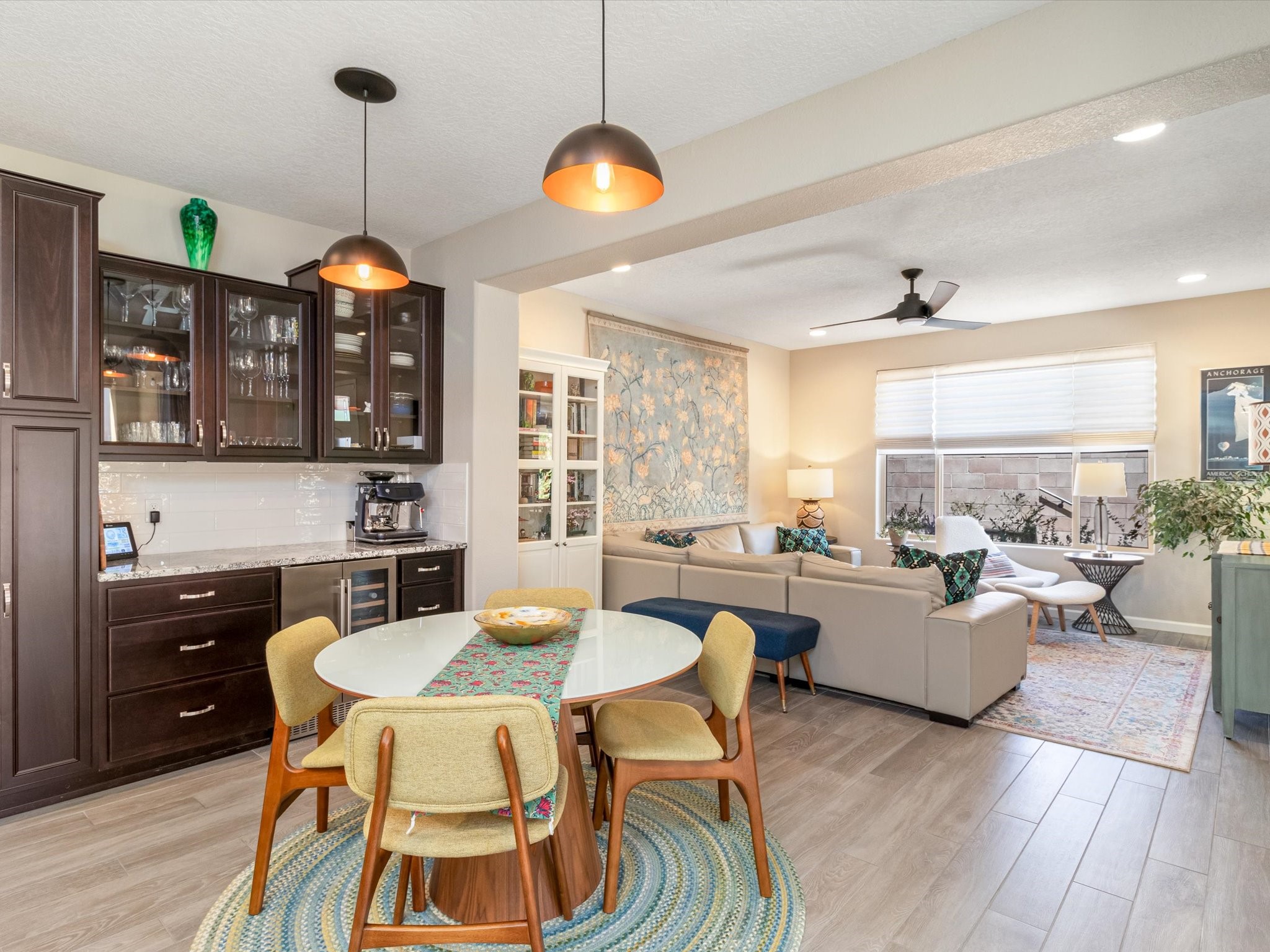 DINING AREA ADJACENT TO LIVING AREA AND KITCHEN AREA