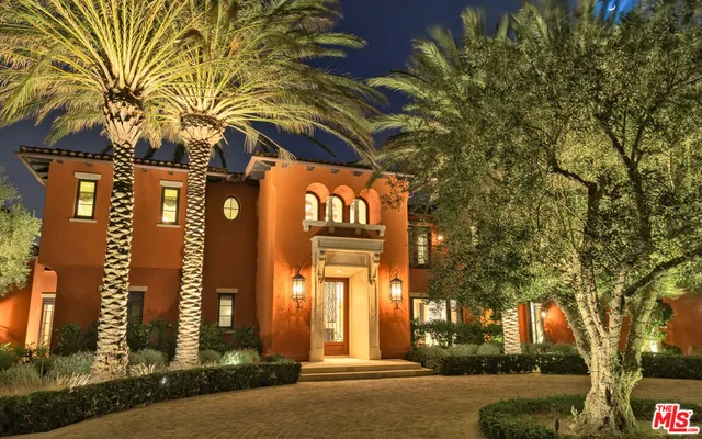 a view of swimming pool with a patio