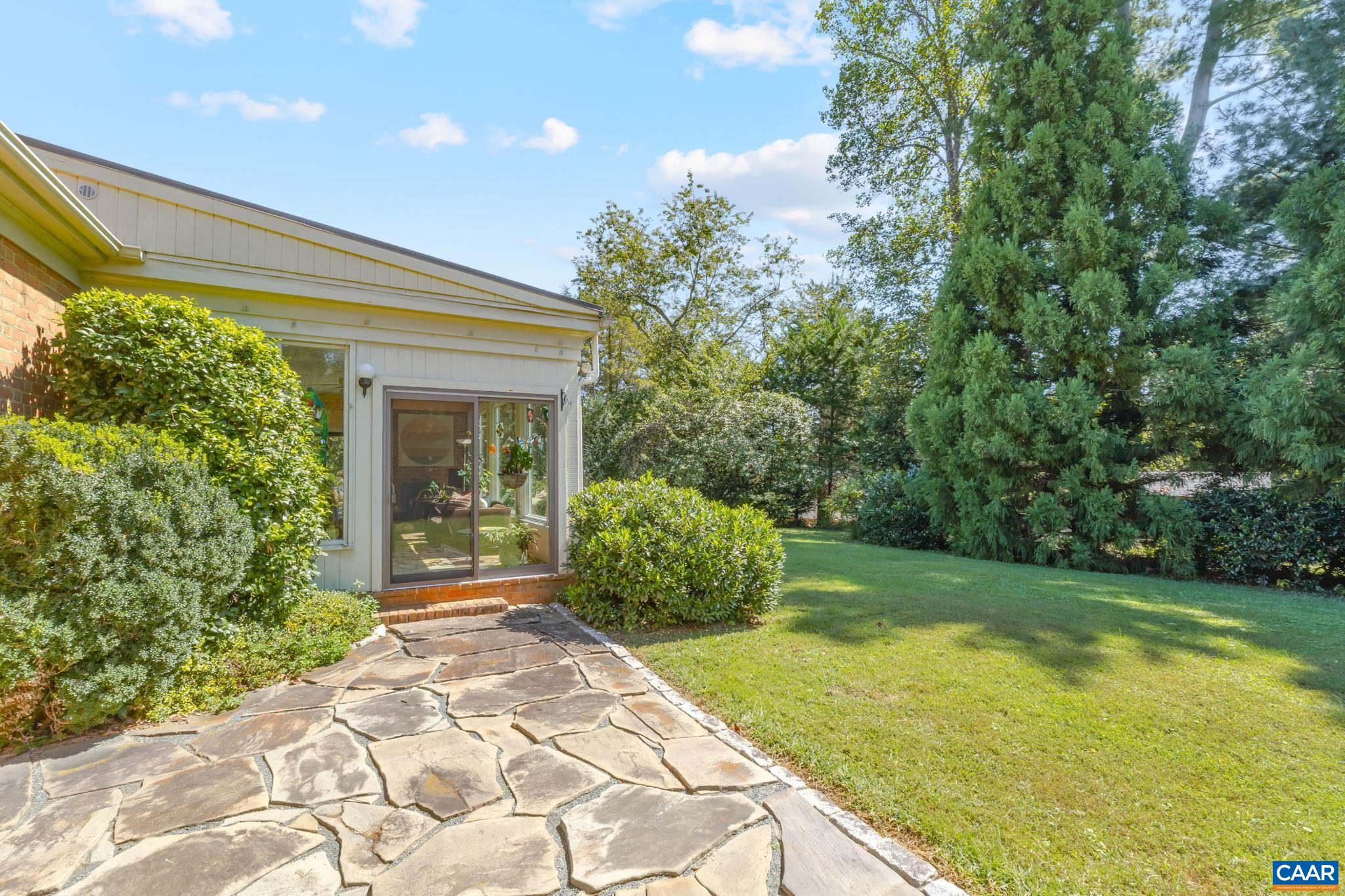 311 Gloucester Road Charlottesville, VA 22901 - Photo 41 of 55 a front view of a house with garden