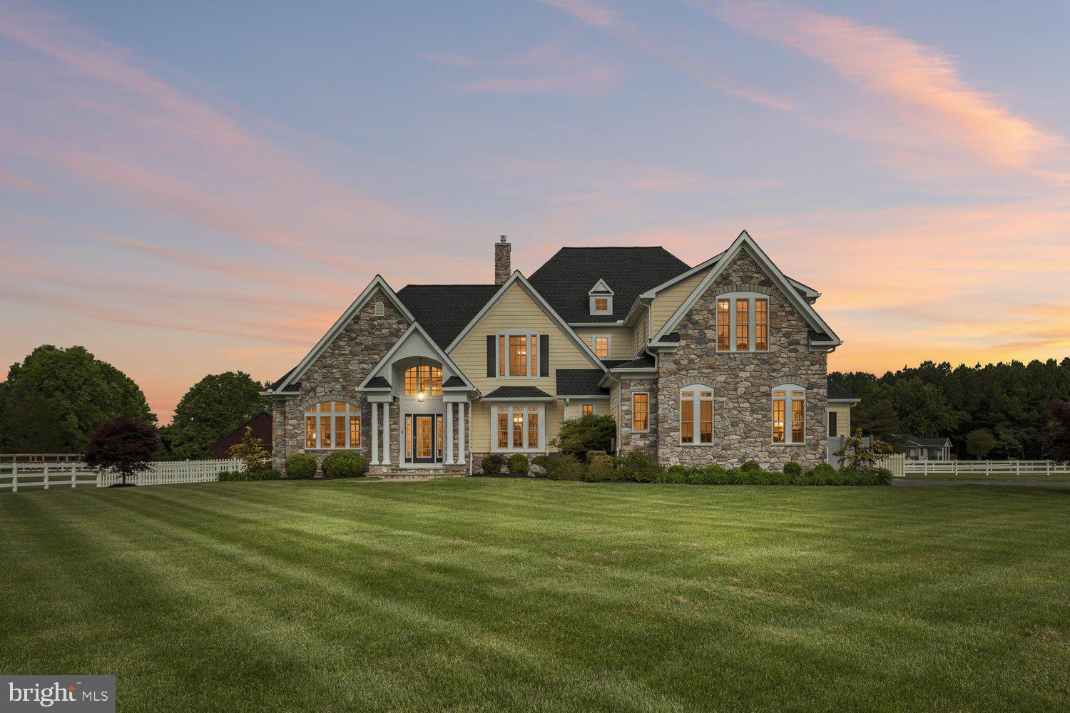 313 Wye Road Queenstown, MD 21658 - Photo 2 of 132 Elegant home bathed in sunset hues.