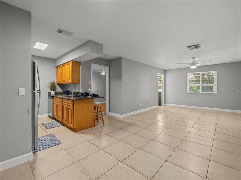 230 Thorntree Place, Unit 230 Brandon, FL 33510 - Photo 16 of 49 a kitchen with granite countertop a stove a sink and a granite counter top