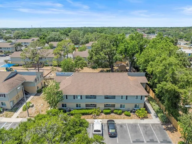 an aerial view of a house with a garden