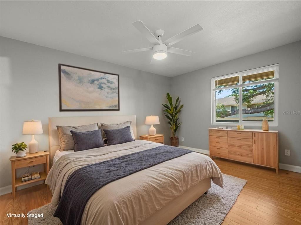 230 Thorntree Place, Unit 230 Brandon, FL 33510 - Photo 28 of 49 a bedroom with a large bed and a window