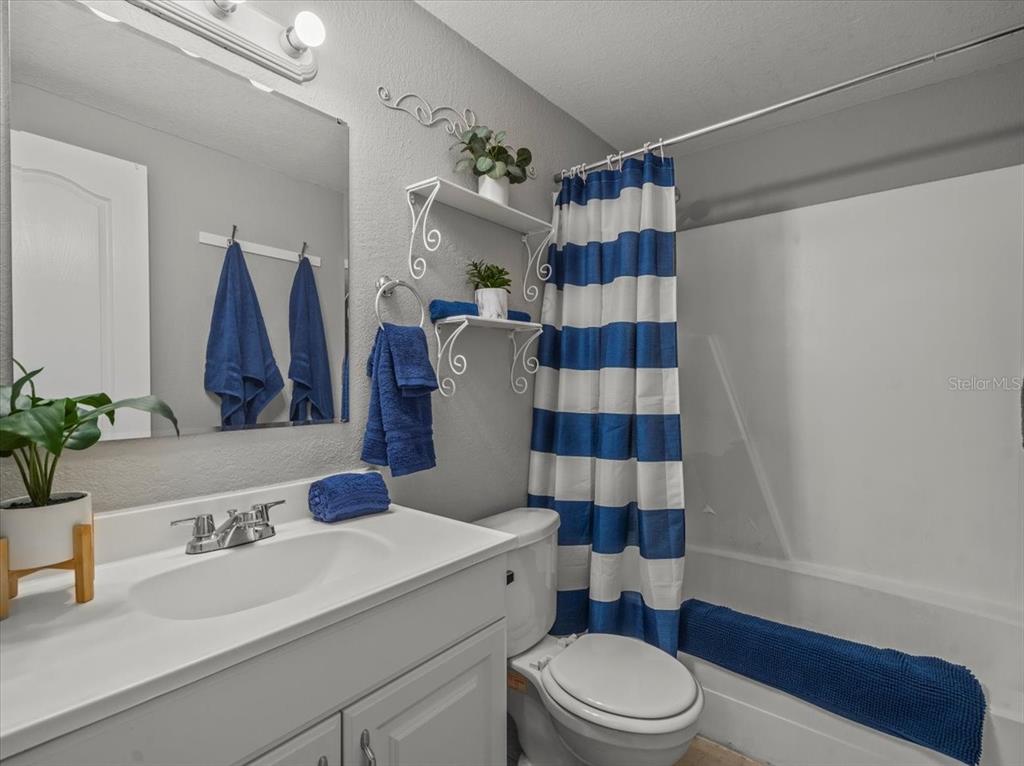 230 Thorntree Place, Unit 230 Brandon, FL 33510 - Photo 34 of 49 a bathroom with a sink a toilet and shower