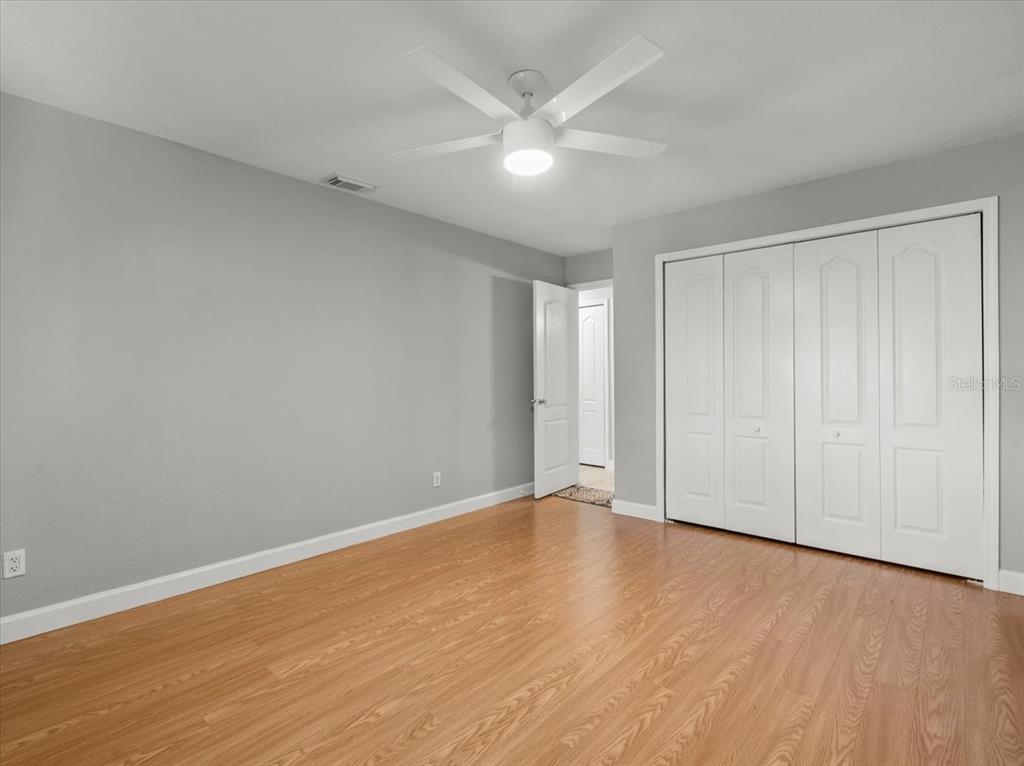 230 Thorntree Place, Unit 230 Brandon, FL 33510 - Photo 37 of 49 a view of an empty room with wooden floor