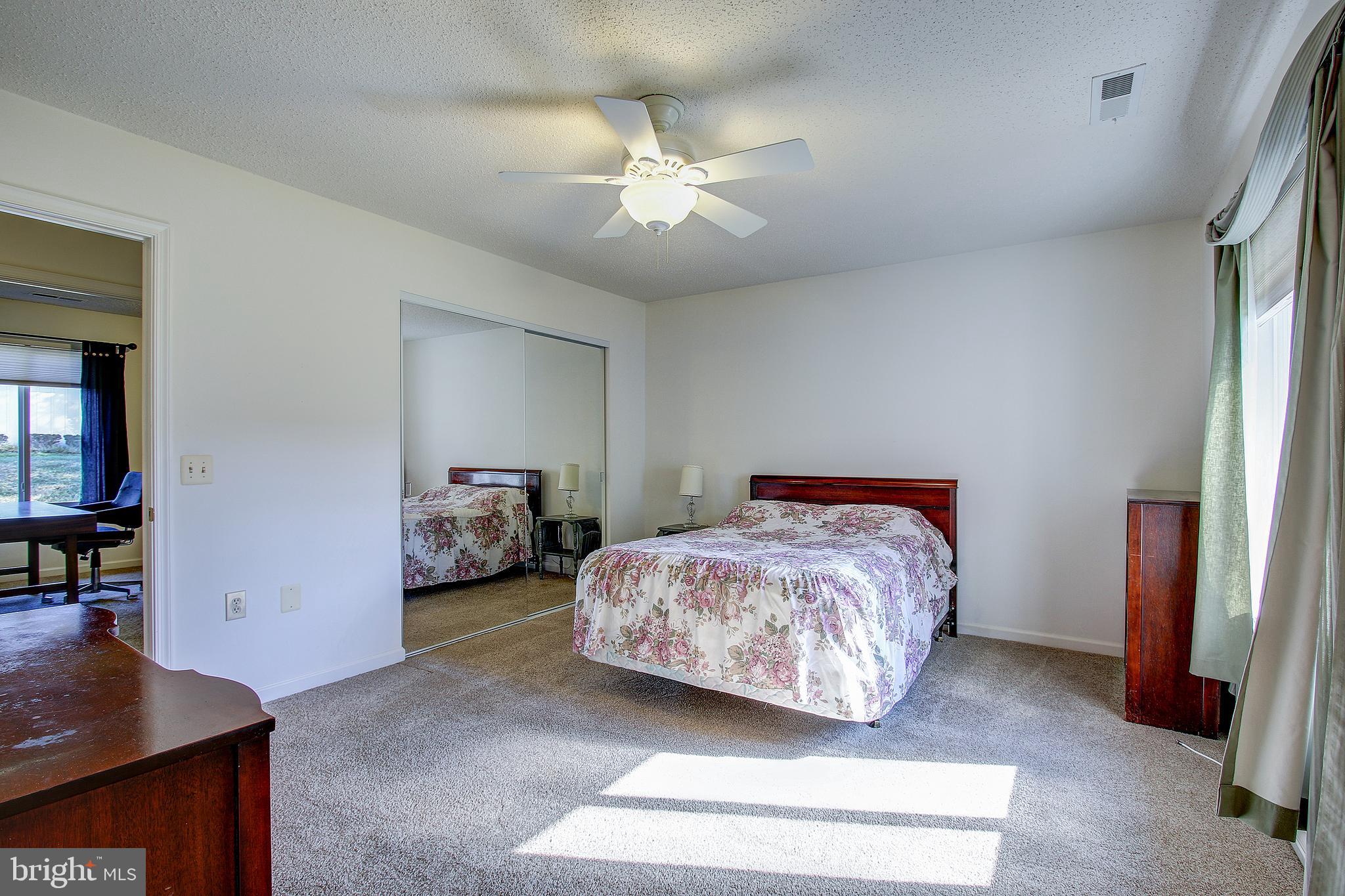 3705 Bethnal Way, Unit 33B Silver Spring, MD 20906 - Photo 13 of 32 Master bedroom with mirrored closet doors