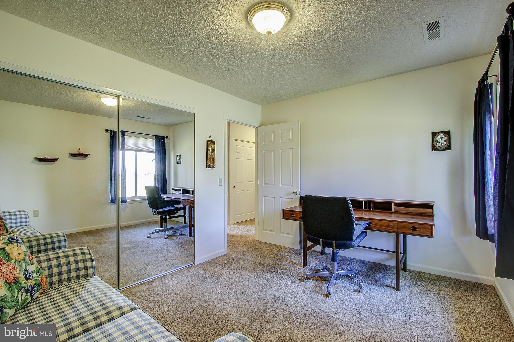 3705 Bethnal Way, Unit 33B Silver Spring, MD 20906 - Photo 16 of 32 Bedroom 2 with mirrored closet doors