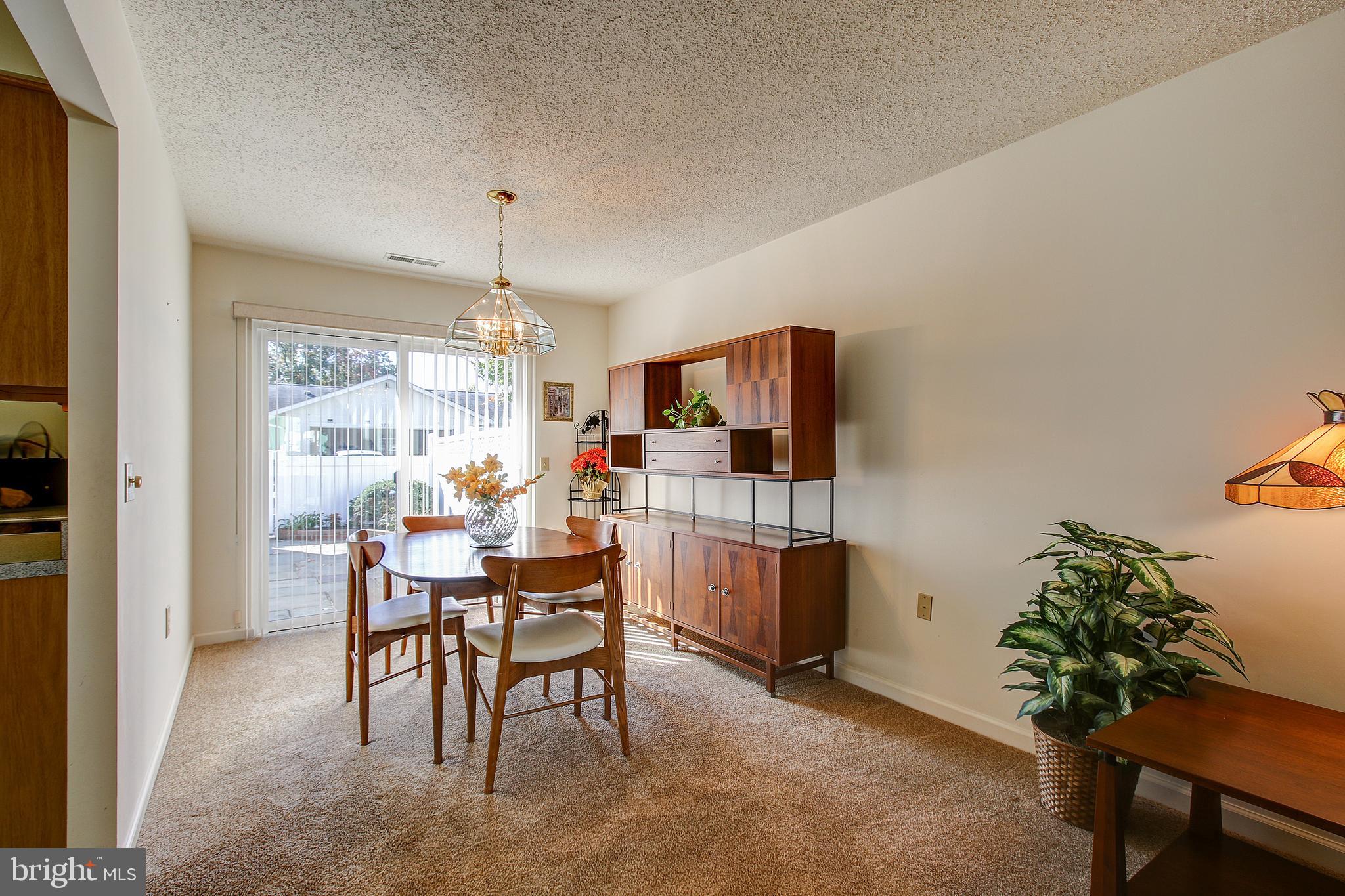 3705 Bethnal Way, Unit 33B Silver Spring, MD 20906 - Photo 7 of 32 Dining room with slider to patio