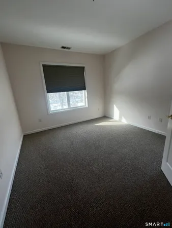 a view of a room with a window