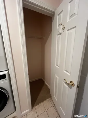 a view of a storage and utility room with a sink