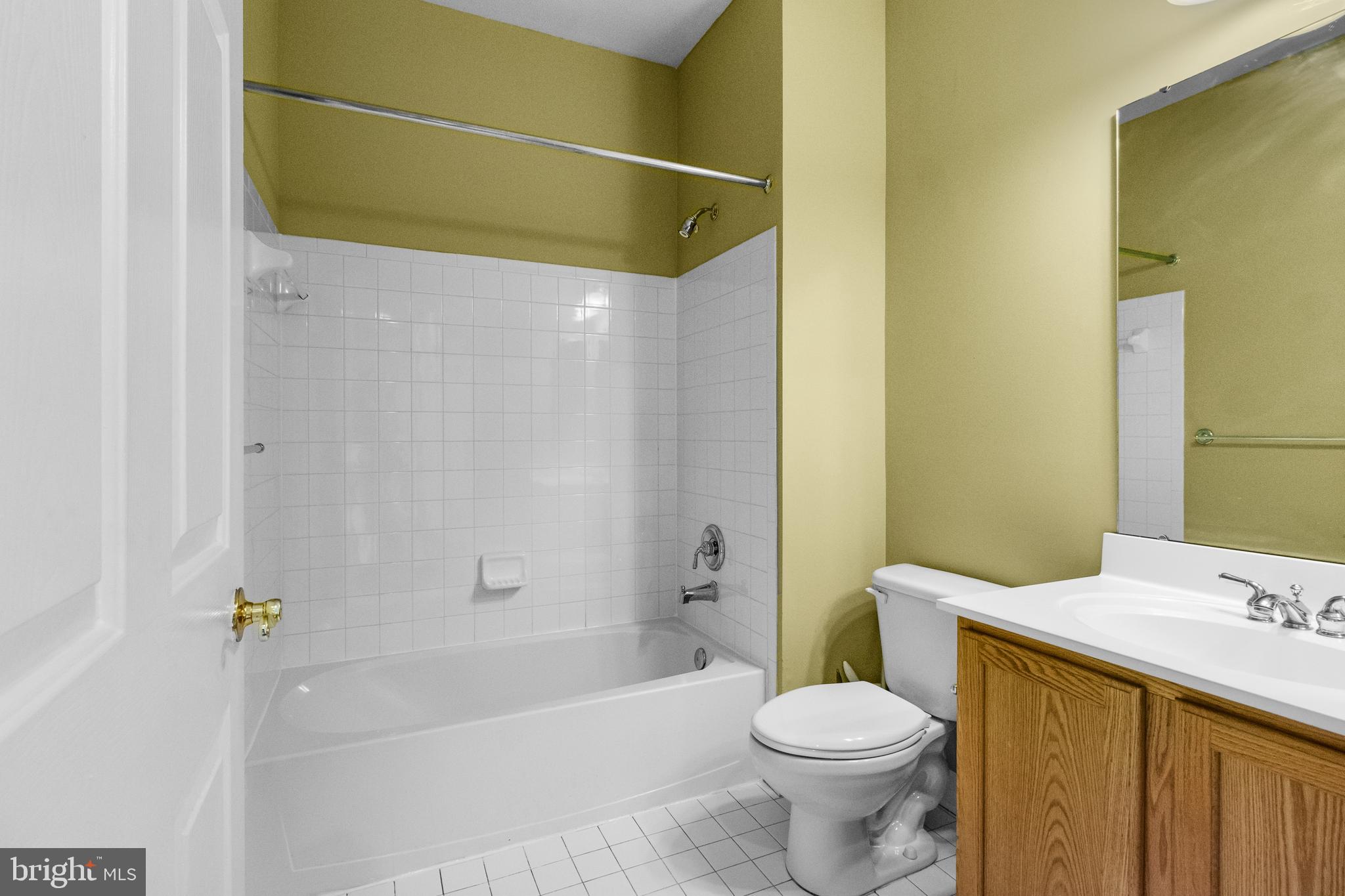 14107 Mintlaw Landing Laurel, MD 20707 - Photo 13 of 63 a bathroom with a sink toilet and shower