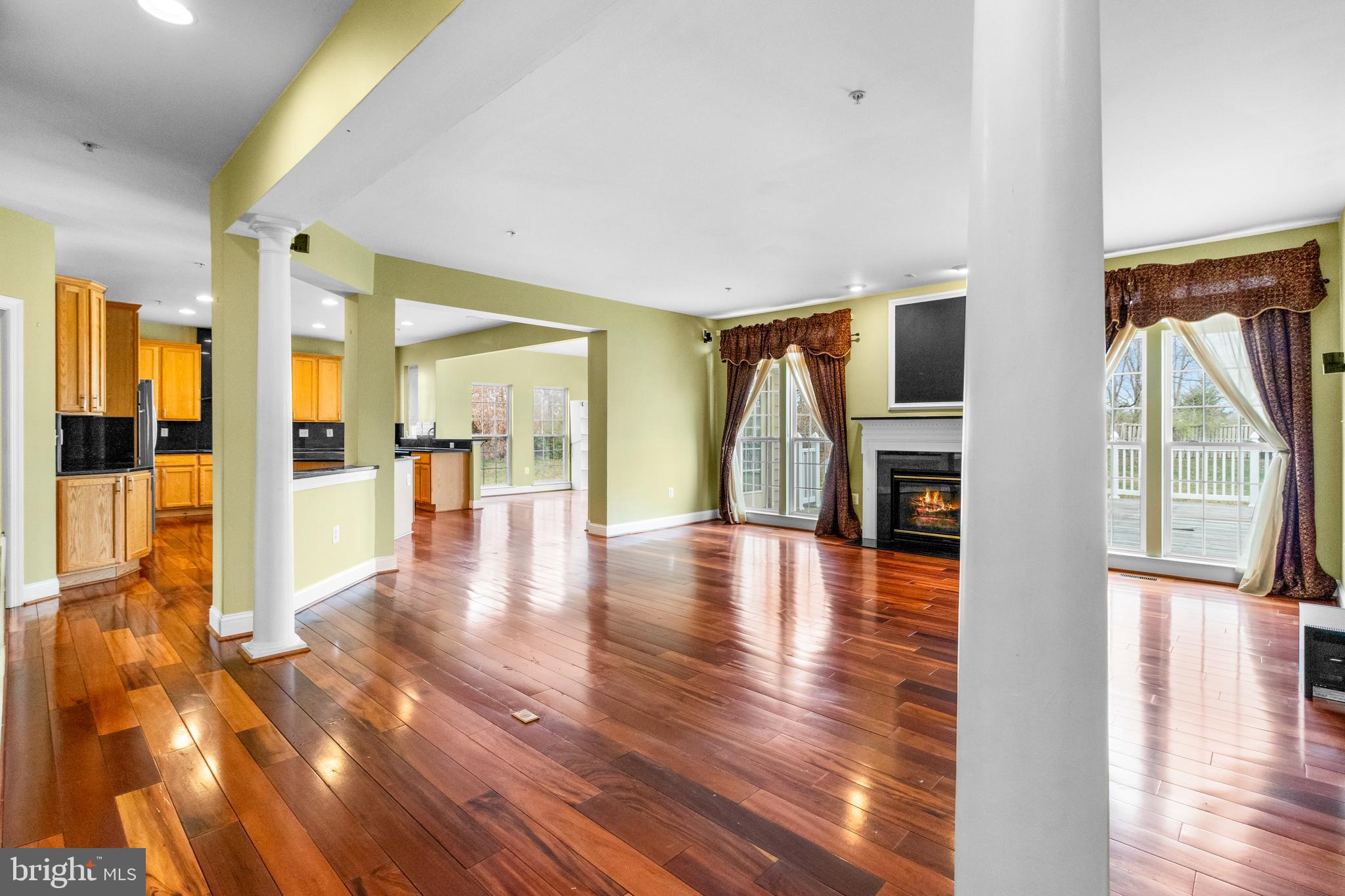 14107 Mintlaw Landing Laurel, MD 20707 - Photo 14 of 63 a view of a hallway with wooden floor and windows