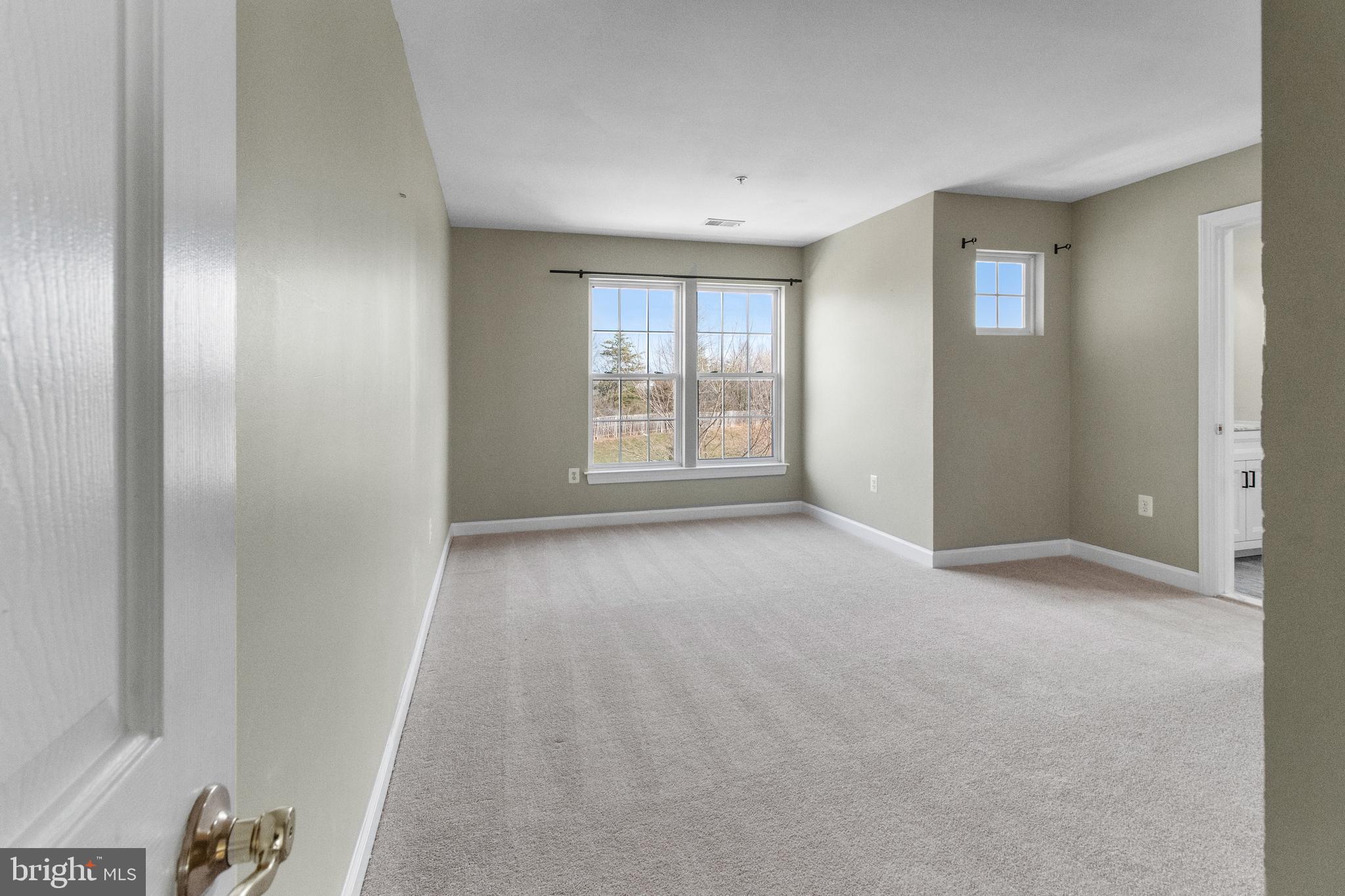 14107 Mintlaw Landing Laurel, MD 20707 - Photo 32 of 63 a view of a big room with windows and closet