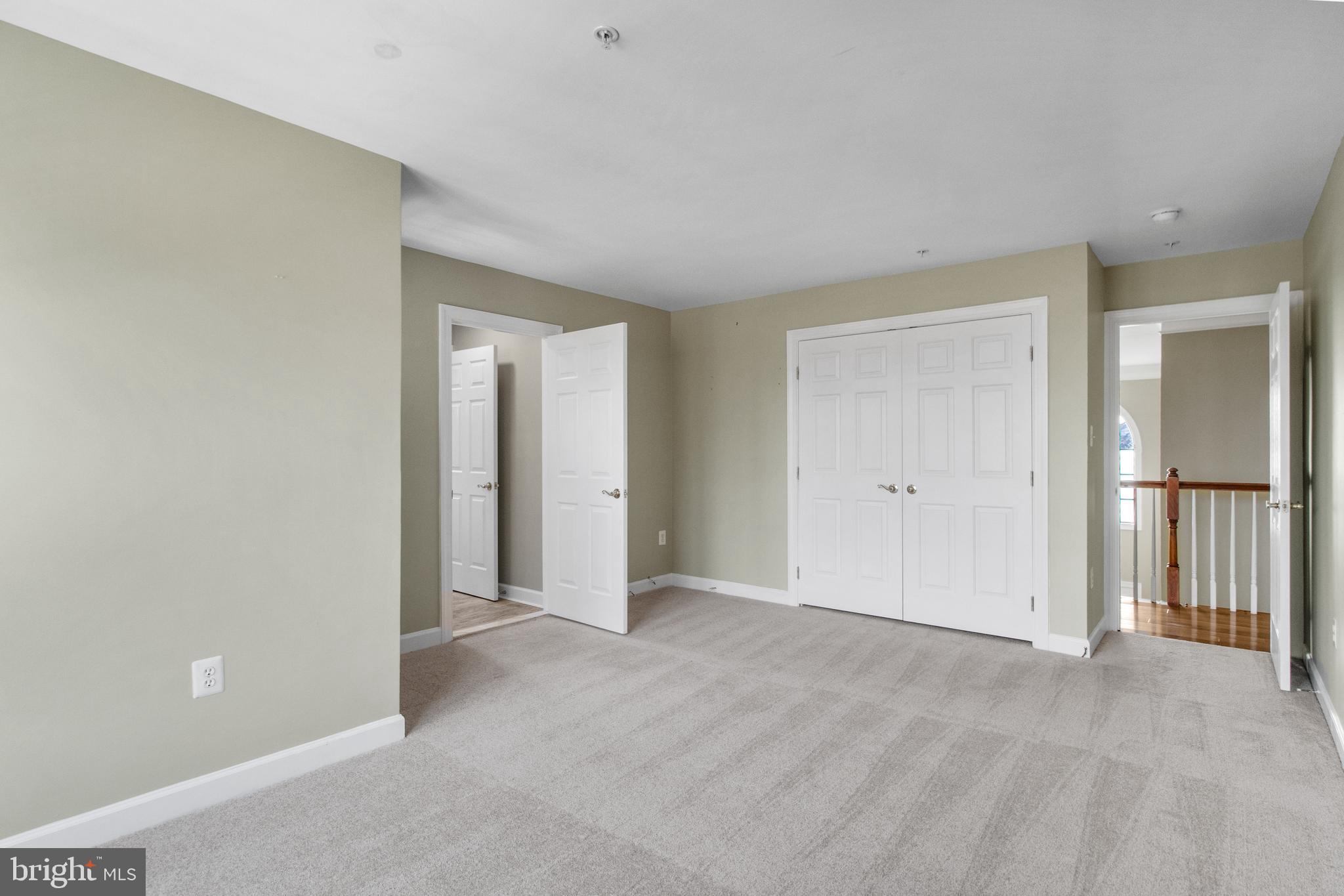14107 Mintlaw Landing Laurel, MD 20707 - Photo 33 of 63 a view of an empty room and closet area