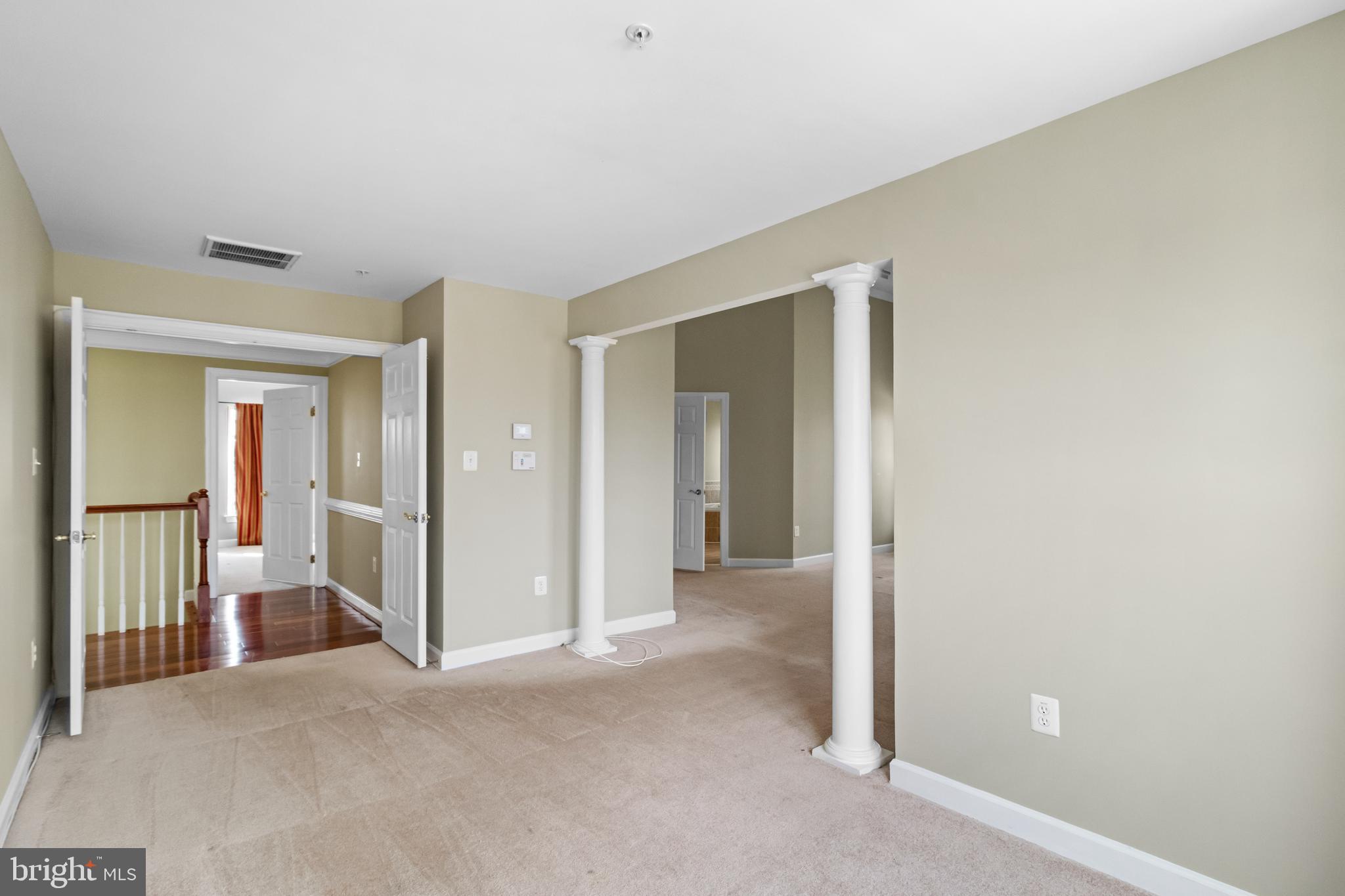 14107 Mintlaw Landing Laurel, MD 20707 - Photo 38 of 63 wooden floor and closet in a room