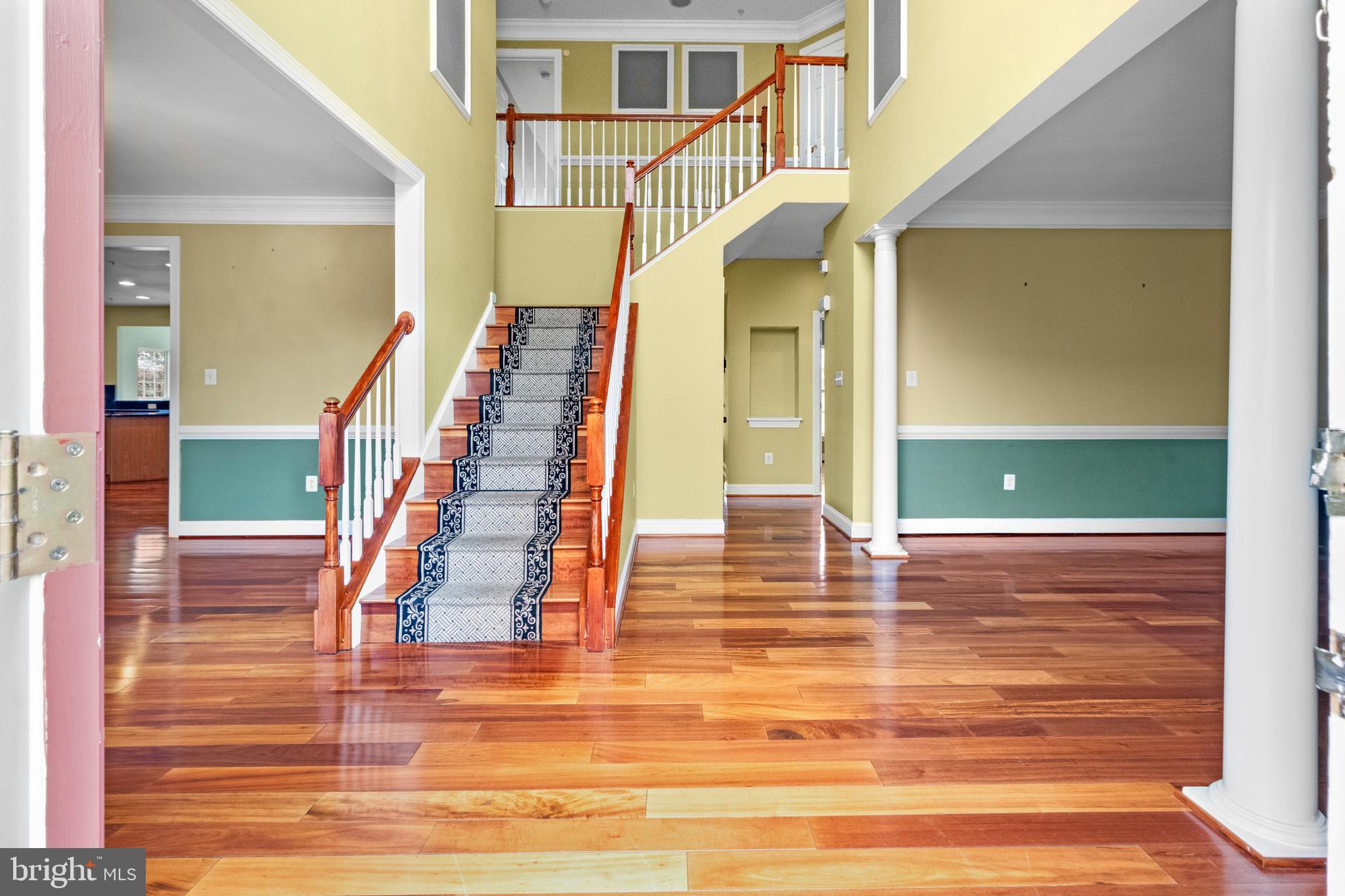 14107 Mintlaw Landing Laurel, MD 20707 - Photo 4 of 63 a view of entryway and hall with wooden floor