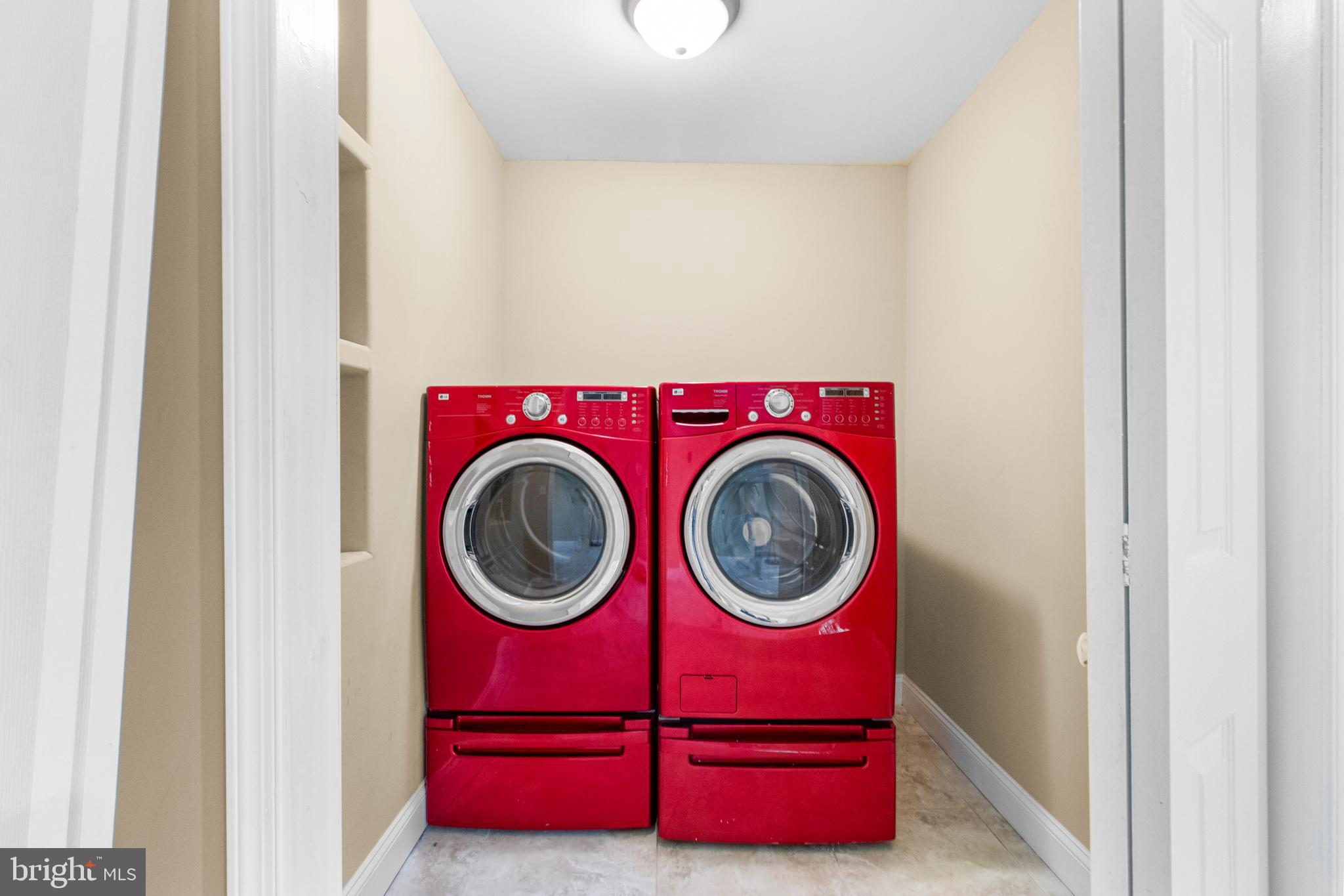 14107 Mintlaw Landing Laurel, MD 20707 - Photo 48 of 63 a utility room with dryer and washer