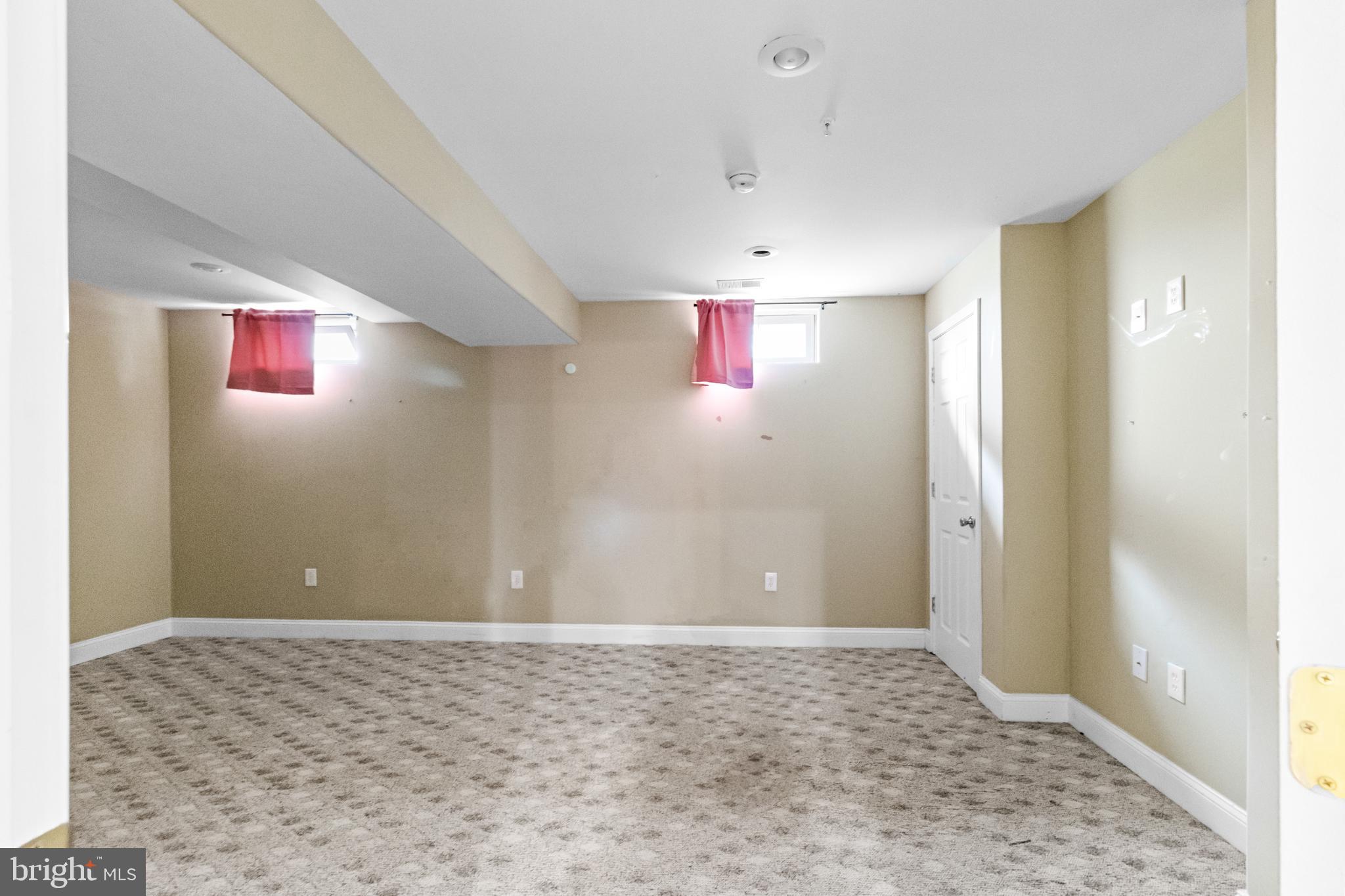 14107 Mintlaw Landing Laurel, MD 20707 - Photo 54 of 63 a view of a livingroom with an empty space