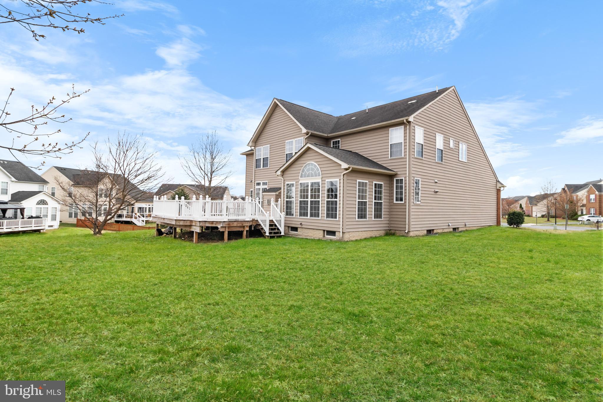 14107 Mintlaw Landing Laurel, MD 20707 - Photo 62 of 63 a view of a house with a yard
