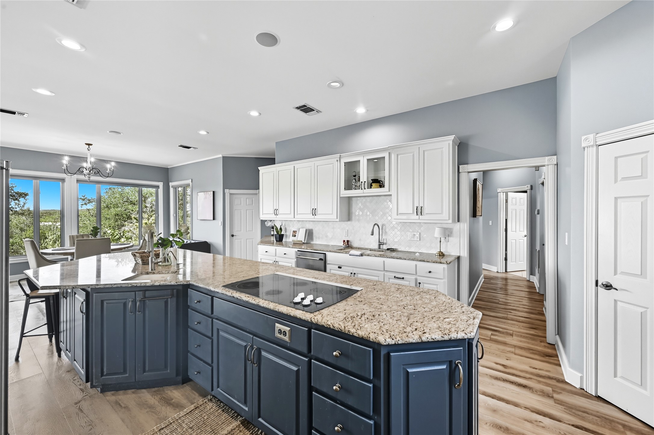 8075 Mt Sharp Road Wimberley, TX 78676 - Photo 10 of 30 a kitchen with a stove a sink and a refrigerator