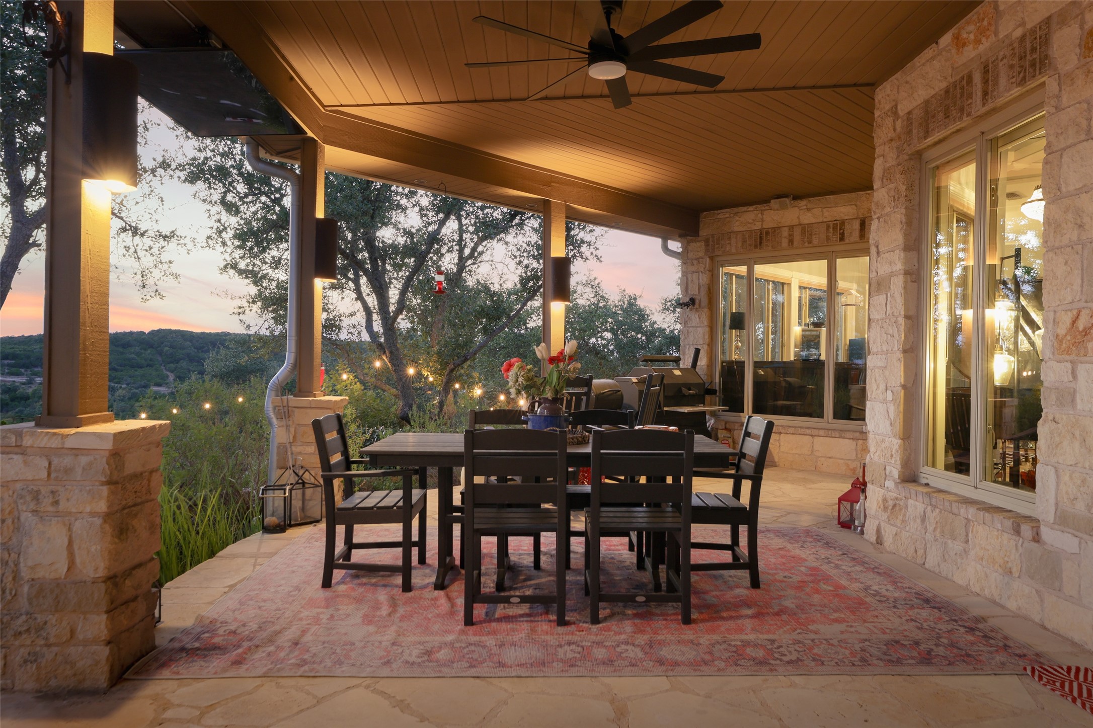8075 Mt Sharp Road Wimberley, TX 78676 - Photo 19 of 30 a view of a dining room with furniture window and outside view