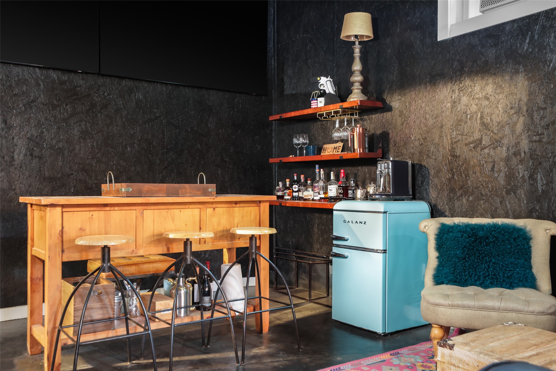 8075 Mt Sharp Road Wimberley, TX 78676 - Photo 22 of 30 a dining room with furniture and wooden floor