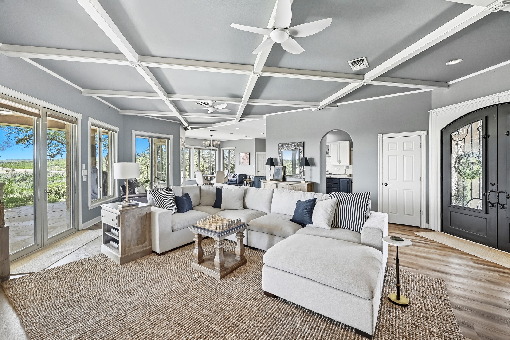 8075 Mt Sharp Road Wimberley, TX 78676 - Photo 29 of 30 a living room with lots of white furniture and a rug