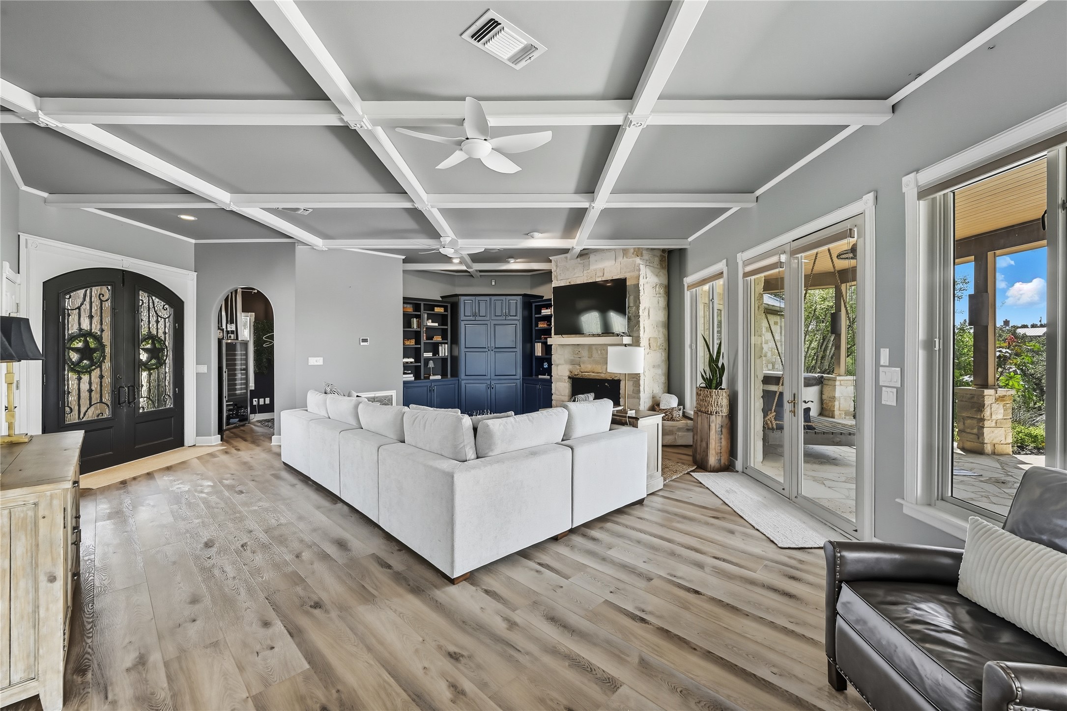 8075 Mt Sharp Road Wimberley, TX 78676 - Photo 6 of 30 a living room with furniture and wooden floors