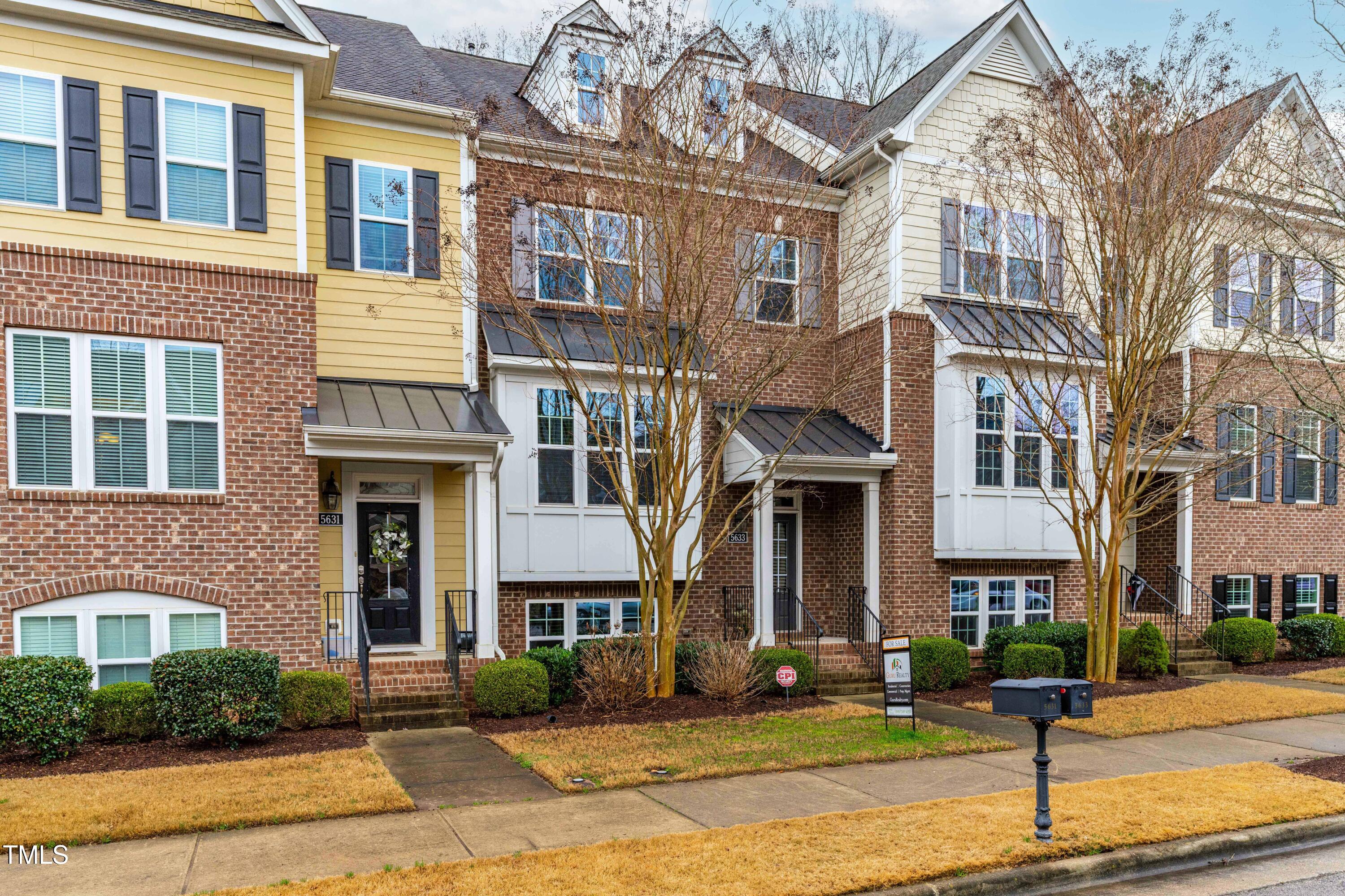 5633 Wade Park Boulevard Raleigh, NC 27607 - Photo 6 of 34 a front view of a multi story building
