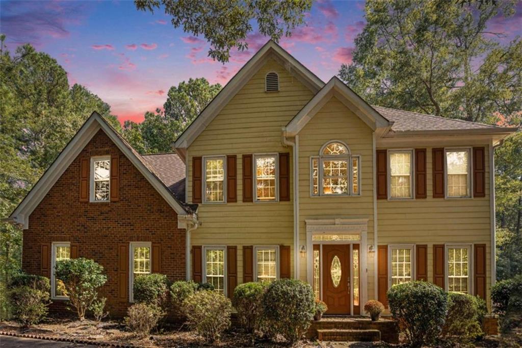 560 Ridgemont Drive Fayetteville, GA 30215 - Photo 1 of 1 front view of a house